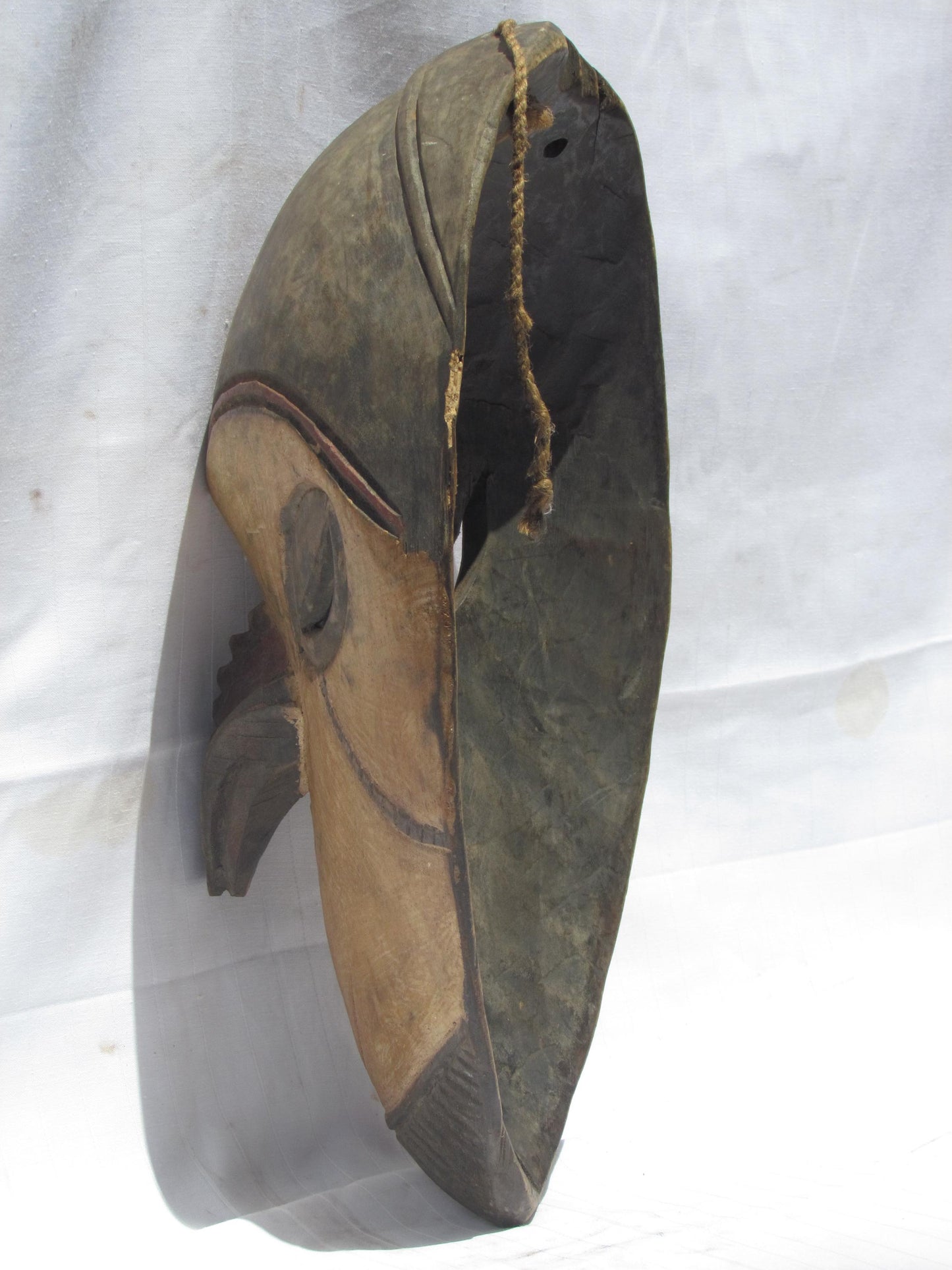 Vintage hand carved wall hanging African traditional wooden mask with a long nose from D.R.C.