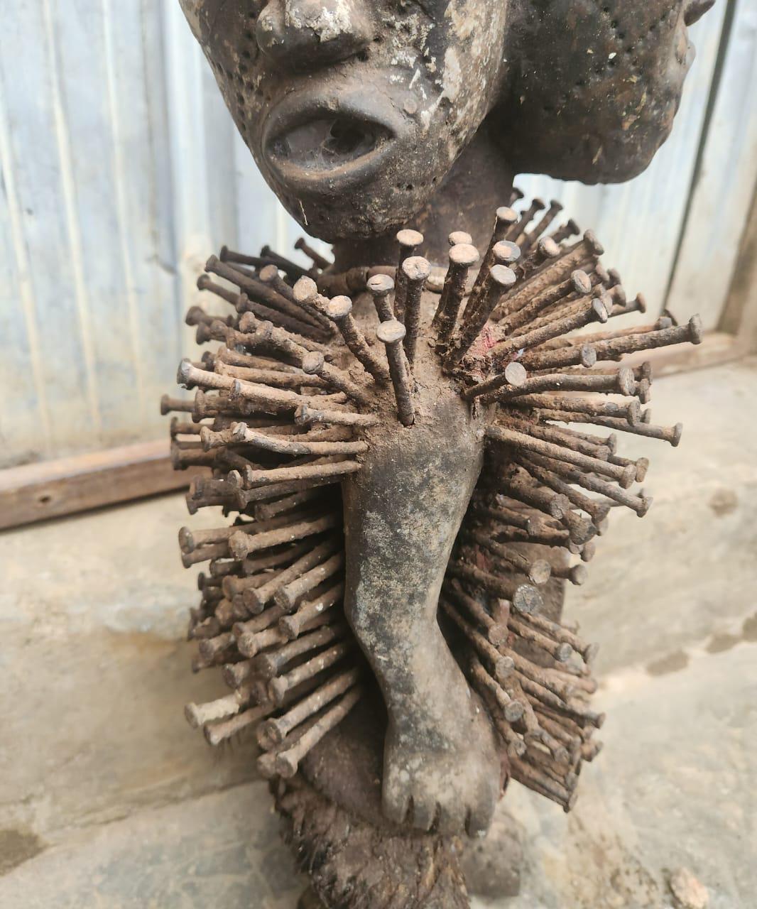African Multi-faced Nkisi – Four-Faced Wood Congo Nail Power Statue Art