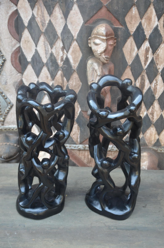 Matching Pair of Hand-Carved African "Circle of Unity" Sculptures
