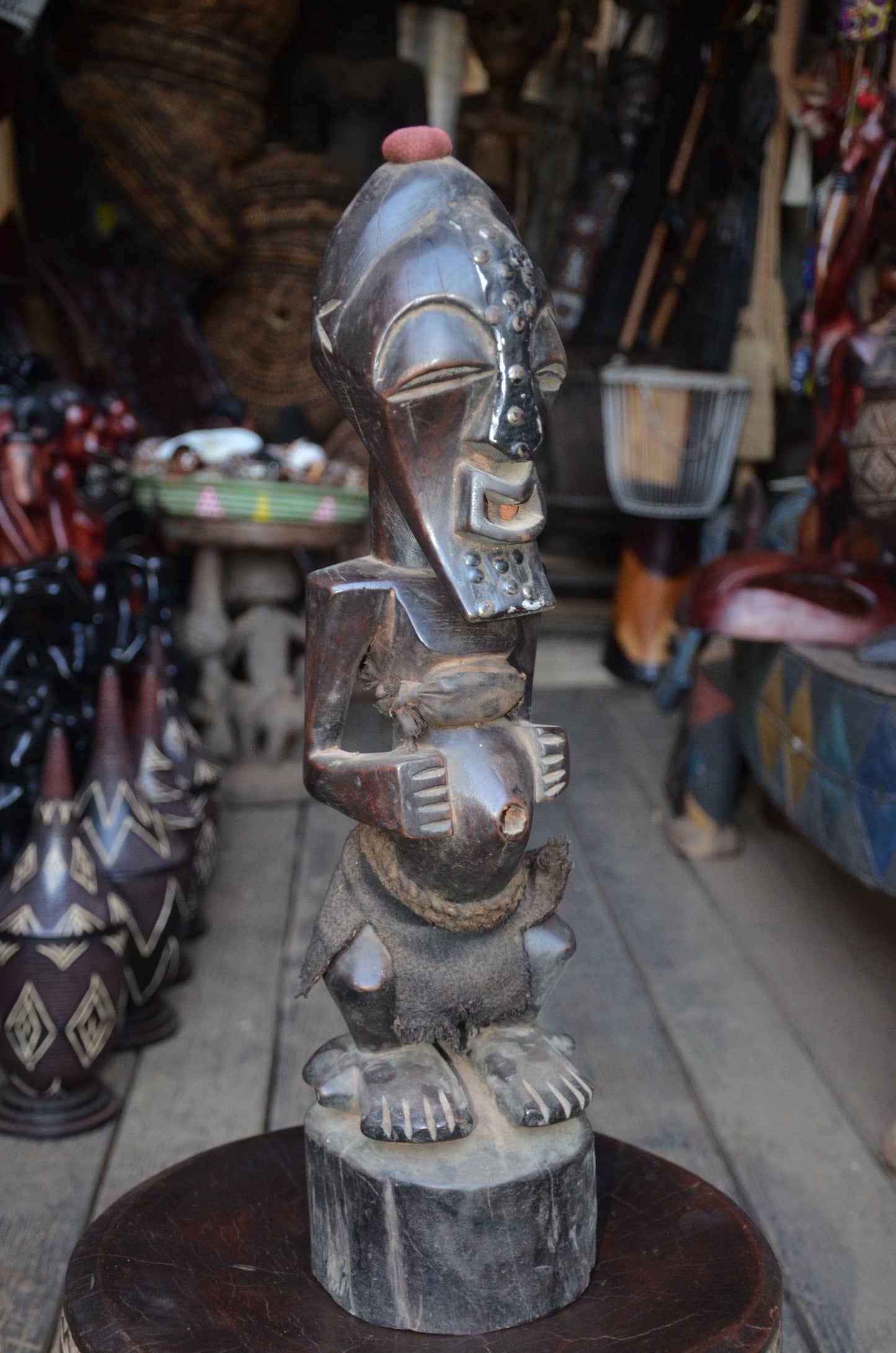Authentic Songye Power Figure - 21" Hand-Carved Wood Nkishi Statue, Traditional Metal Tacks & Medicine Cavity.