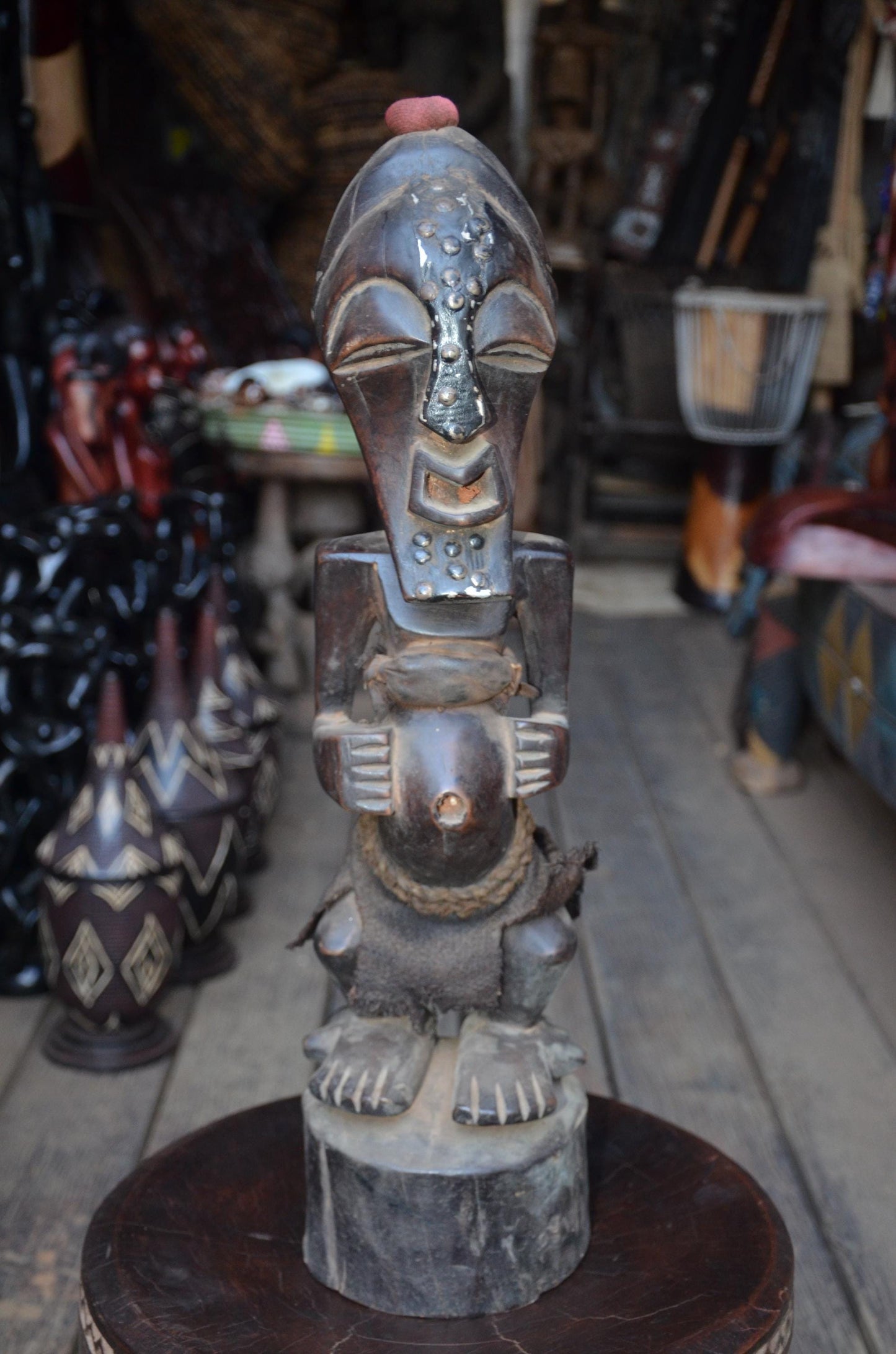 Authentic Songye Power Figure - 21" Hand-Carved Wood Nkishi Statue, Traditional Metal Tacks & Medicine Cavity.