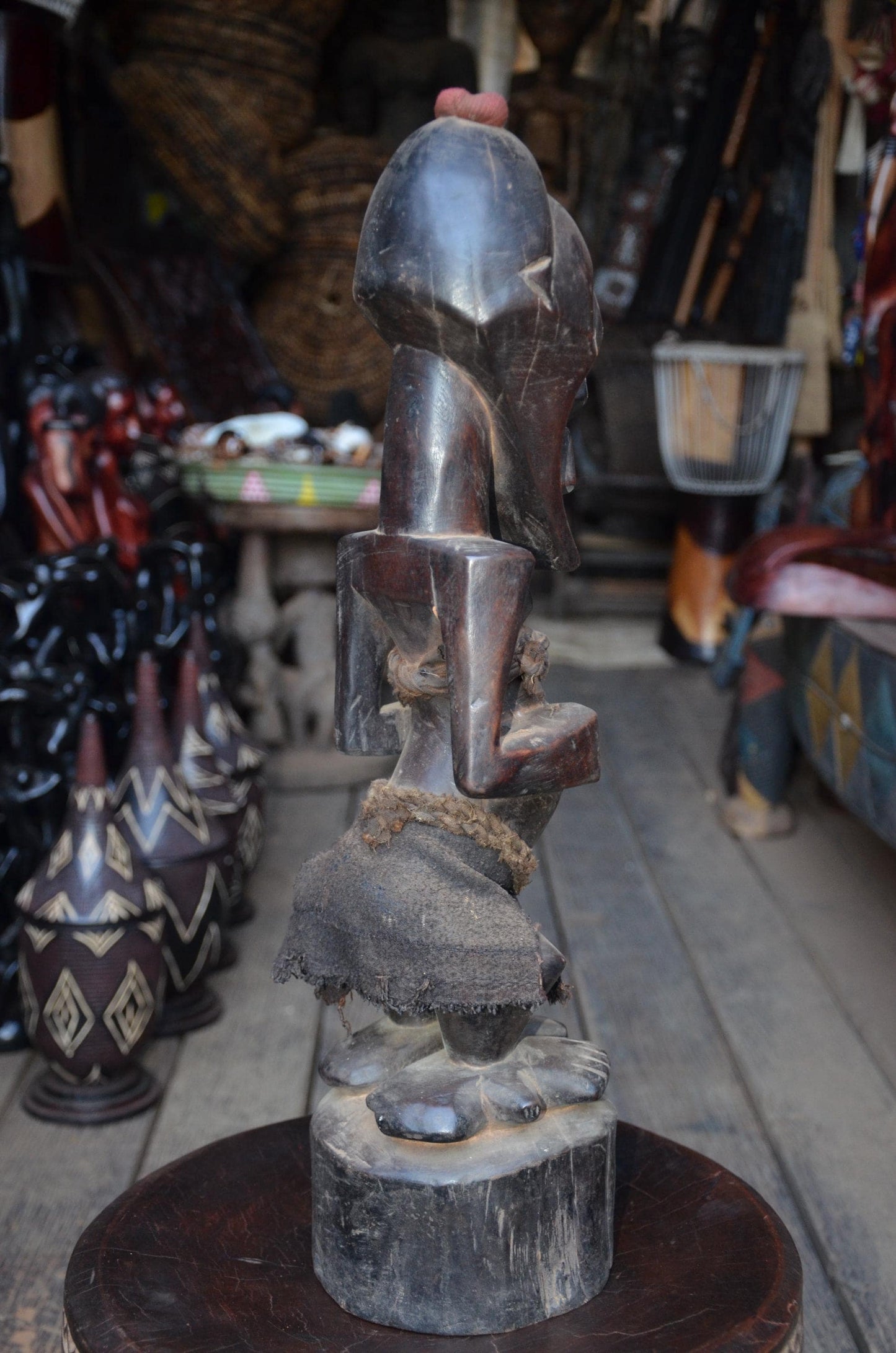 Authentic Songye Power Figure - 21" Hand-Carved Wood Nkishi Statue, Traditional Metal Tacks & Medicine Cavity.