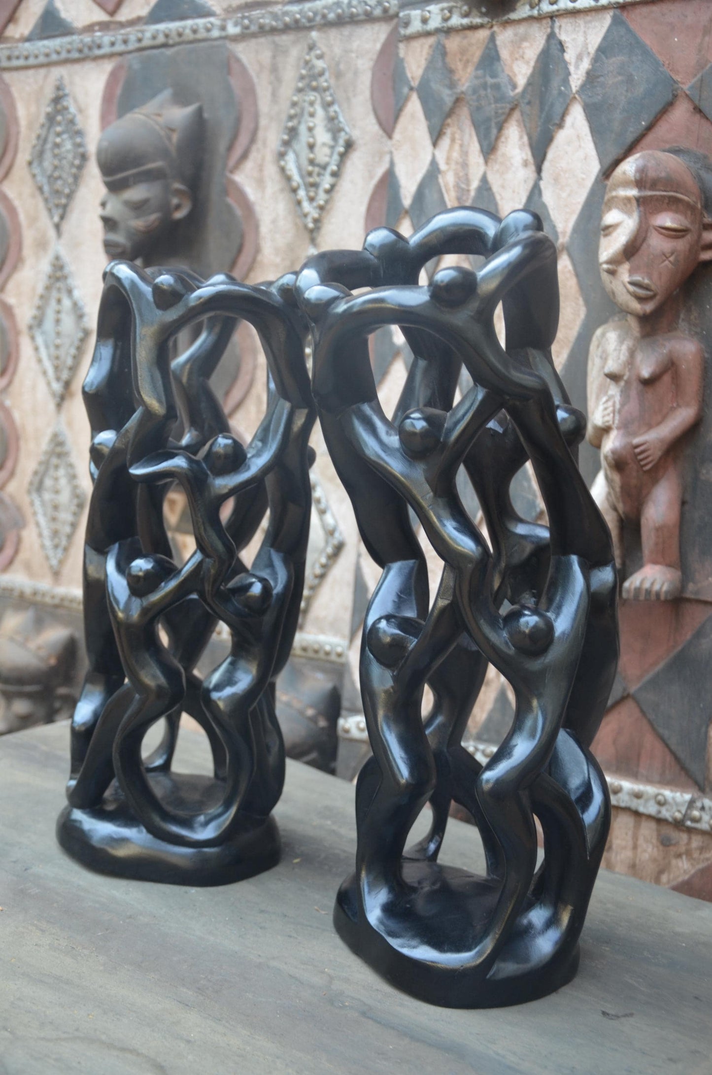 Matching Pair of Hand-Carved African "Circle of Unity" Sculptures