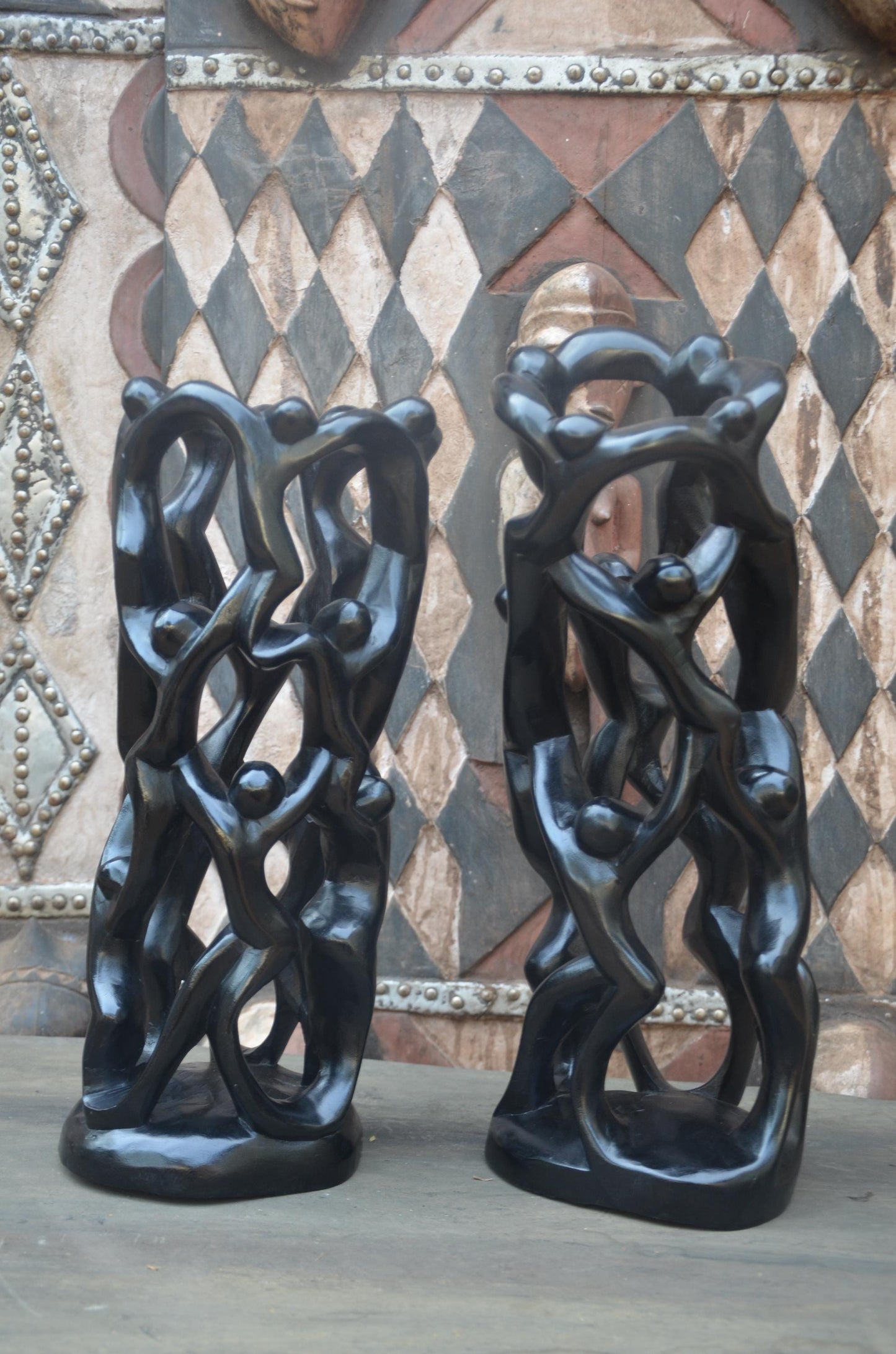 Matching Pair of Hand-Carved African "Circle of Unity" Sculptures