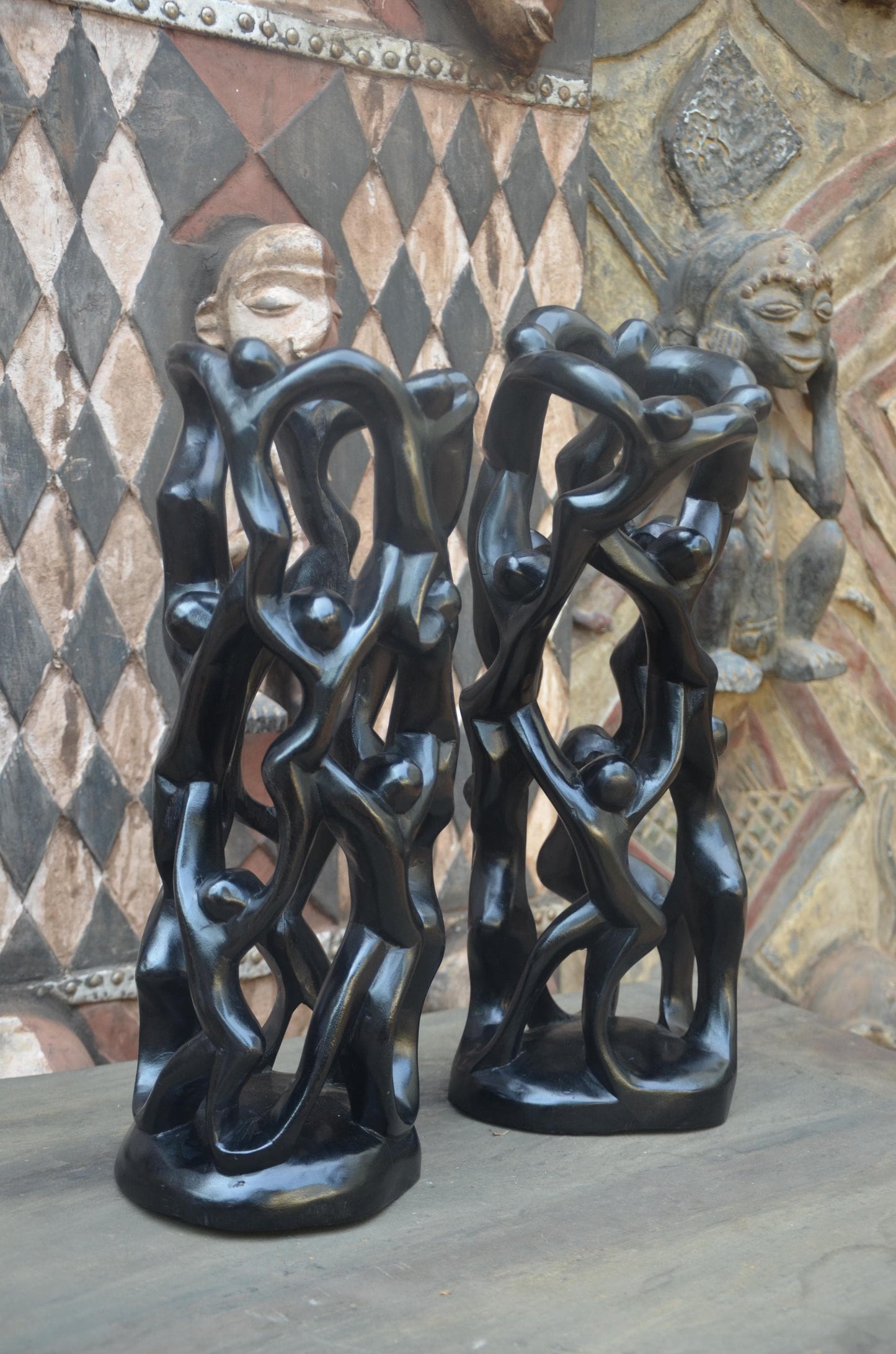 Matching Pair of Hand-Carved African "Circle of Unity" Sculptures