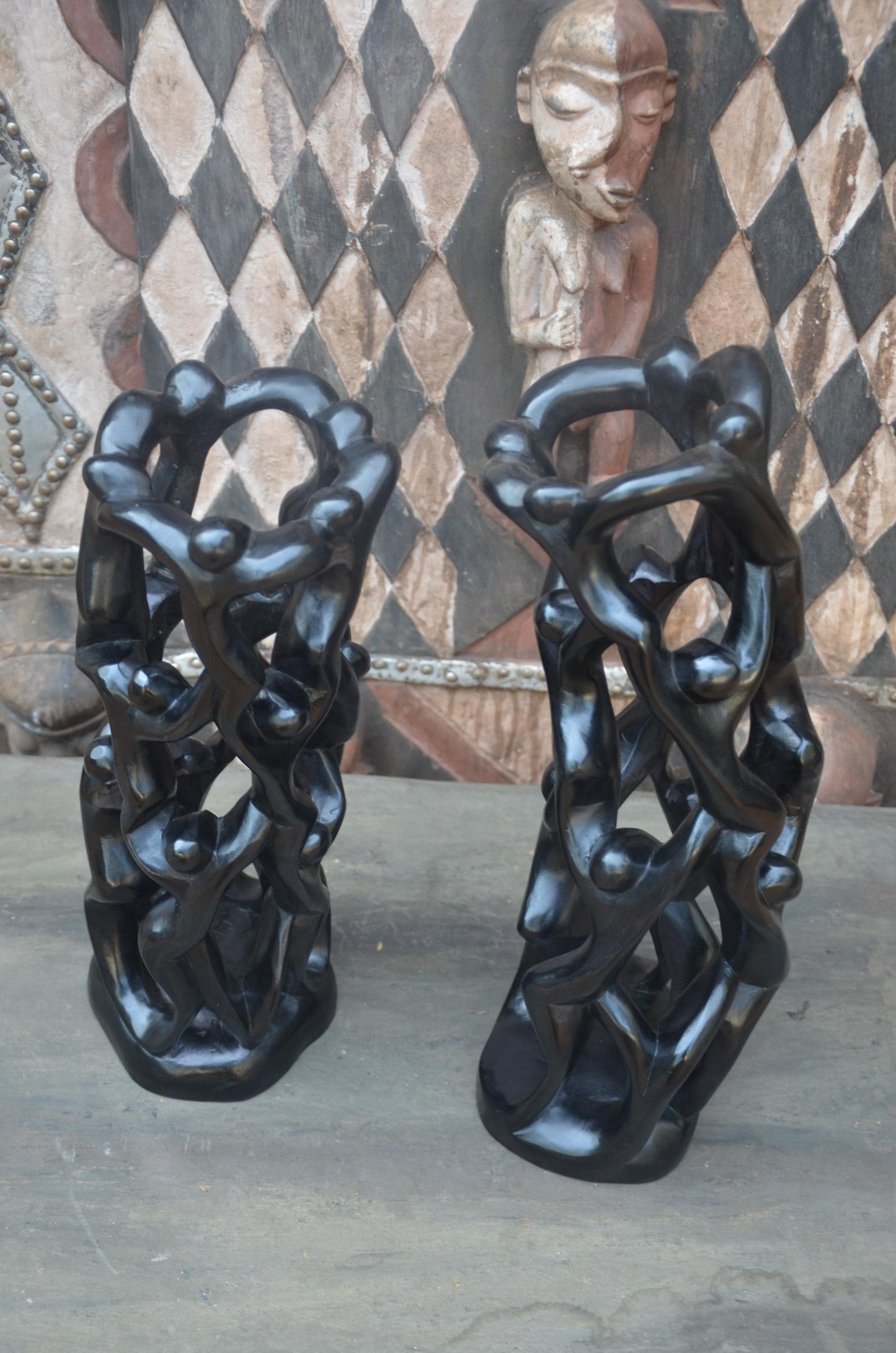 Matching Pair of Hand-Carved African "Circle of Unity" Sculptures