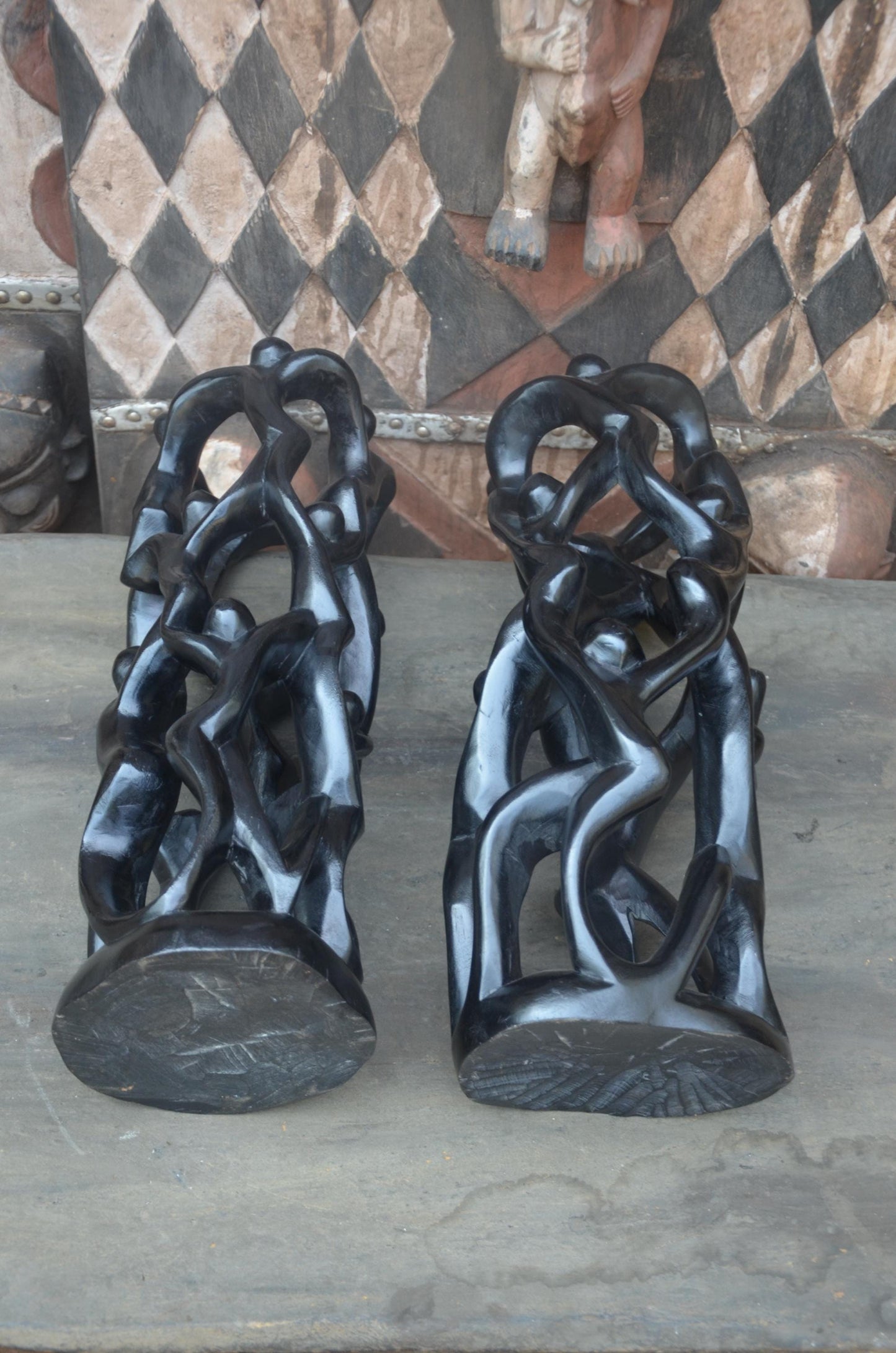 Matching Pair of Hand-Carved African "Circle of Unity" Sculptures