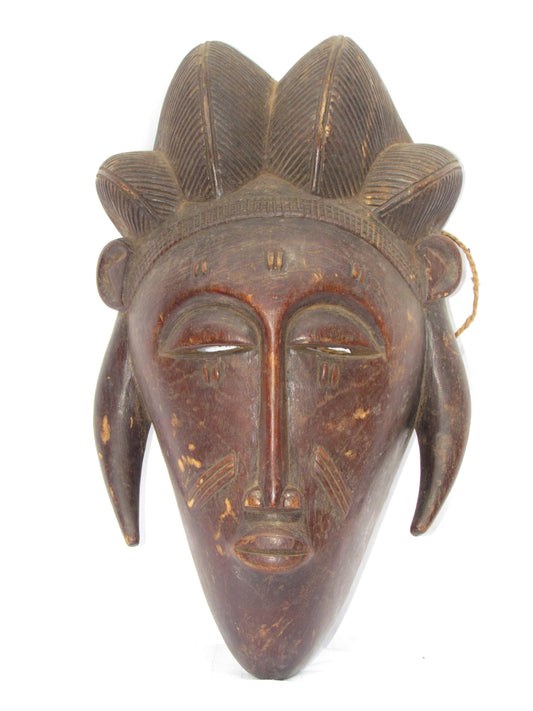 Masques traditionnels africains en bois sculptés à la main, fabriqués en RDC