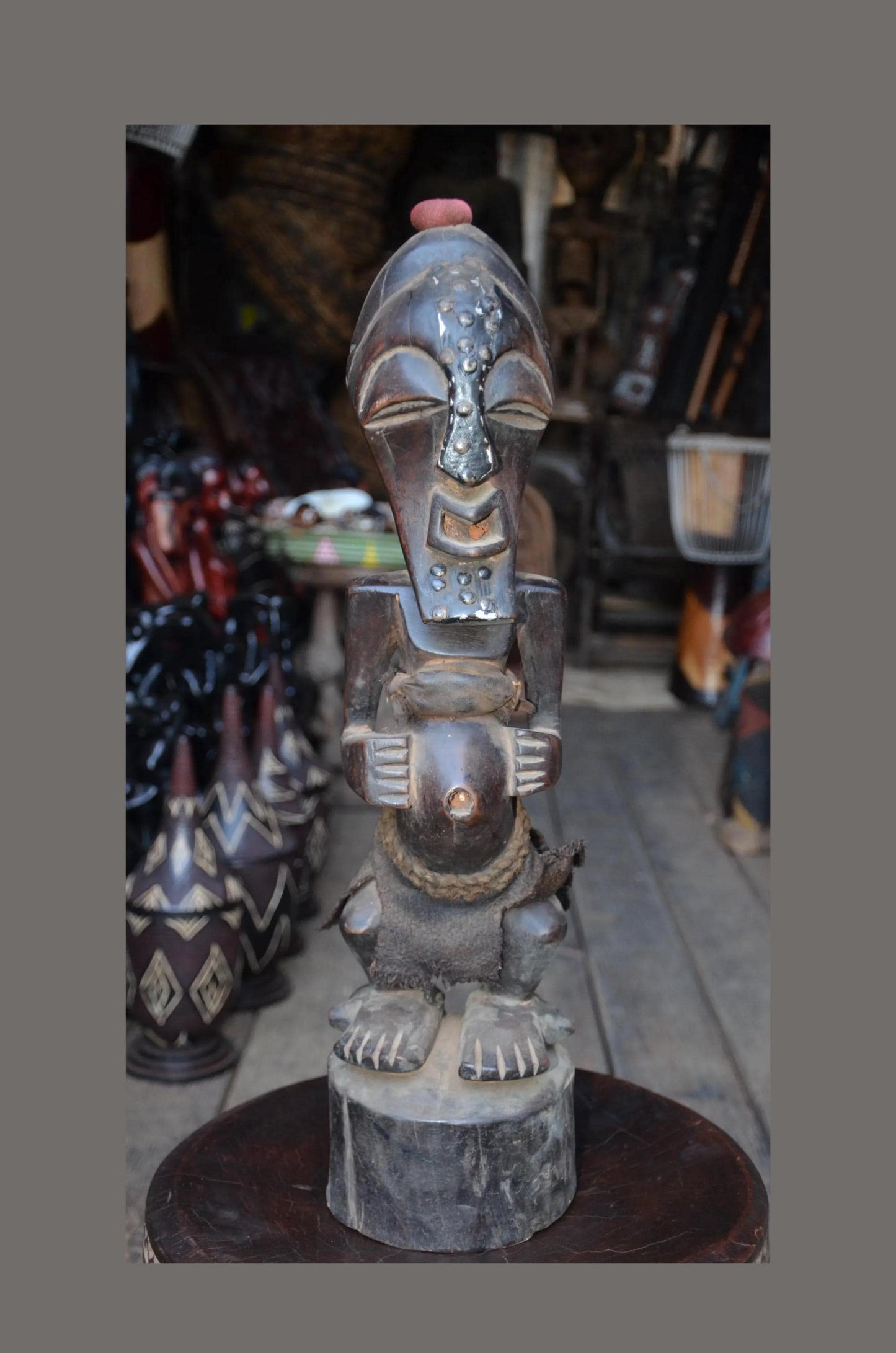 Authentic Songye Power Figure - 21" Hand-Carved Wood Nkishi Statue, Traditional Metal Tacks & Medicine Cavity.