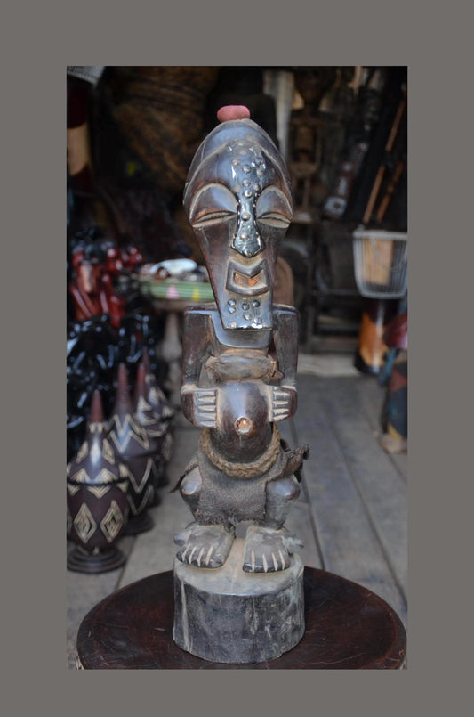 Authentic Songye Power Figure - 21" Hand-Carved Wood Nkishi Statue, Traditional Metal Tacks & Medicine Cavity.