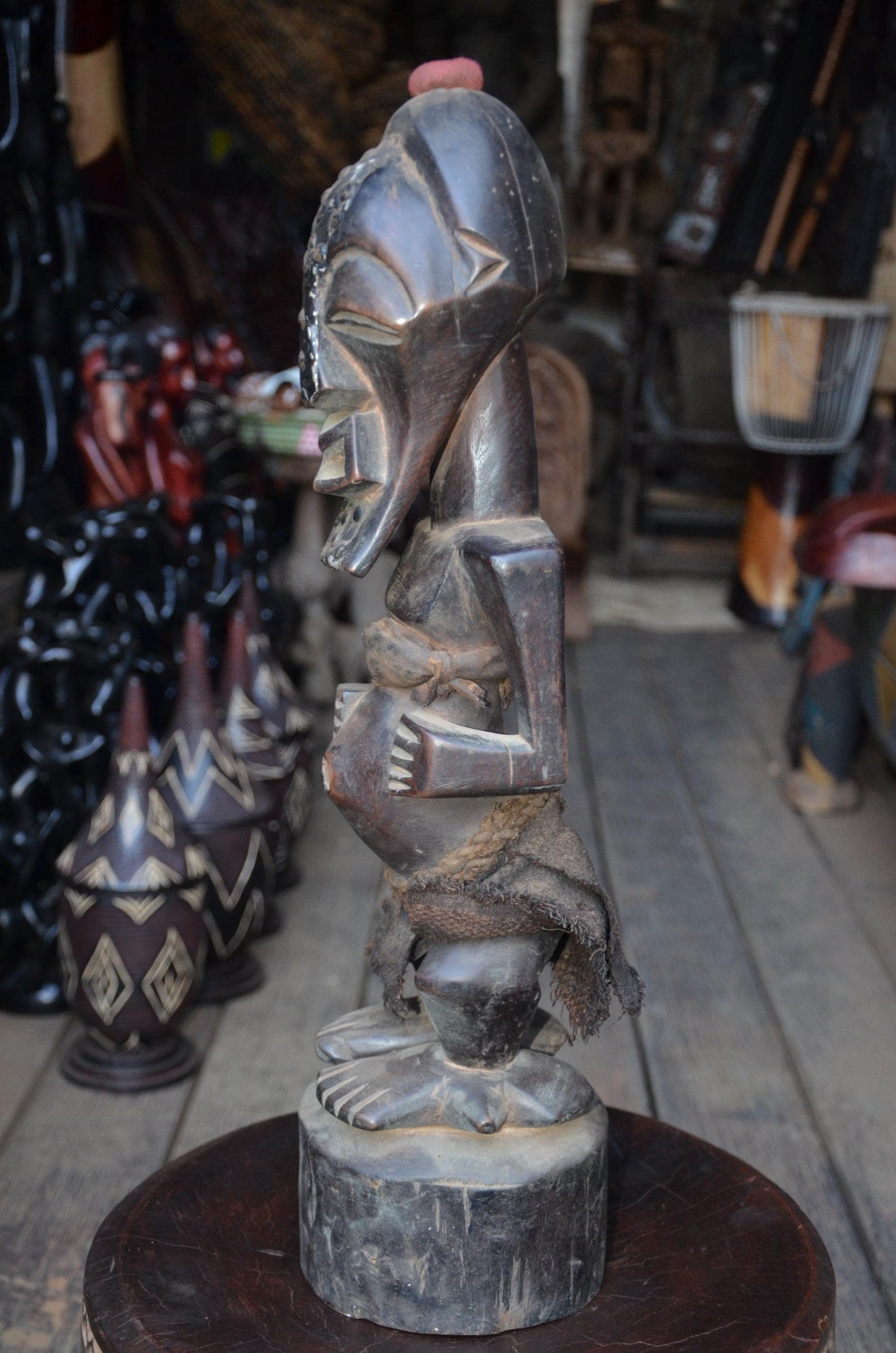 Authentic Songye Power Figure - 21" Hand-Carved Wood Nkishi Statue, Traditional Metal Tacks & Medicine Cavity.