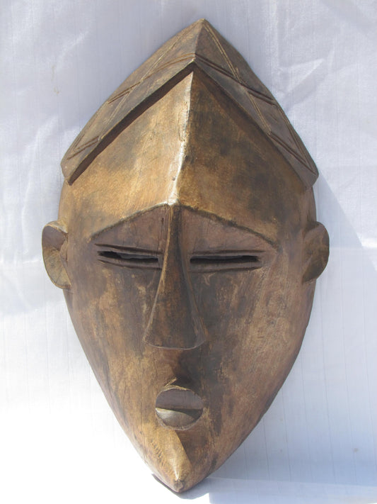 Hand carved wall hanging African traditional wooden masks from D.R.C