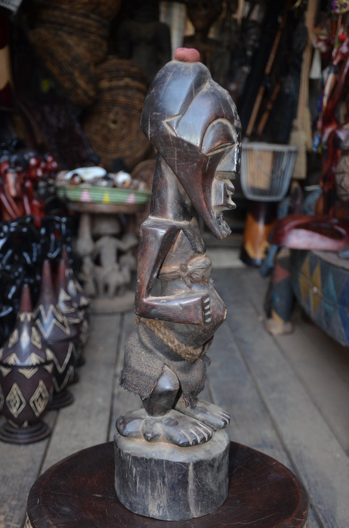 Authentic Songye Power Figure - 21" Hand-Carved Wood Nkishi Statue, Traditional Metal Tacks & Medicine Cavity.
