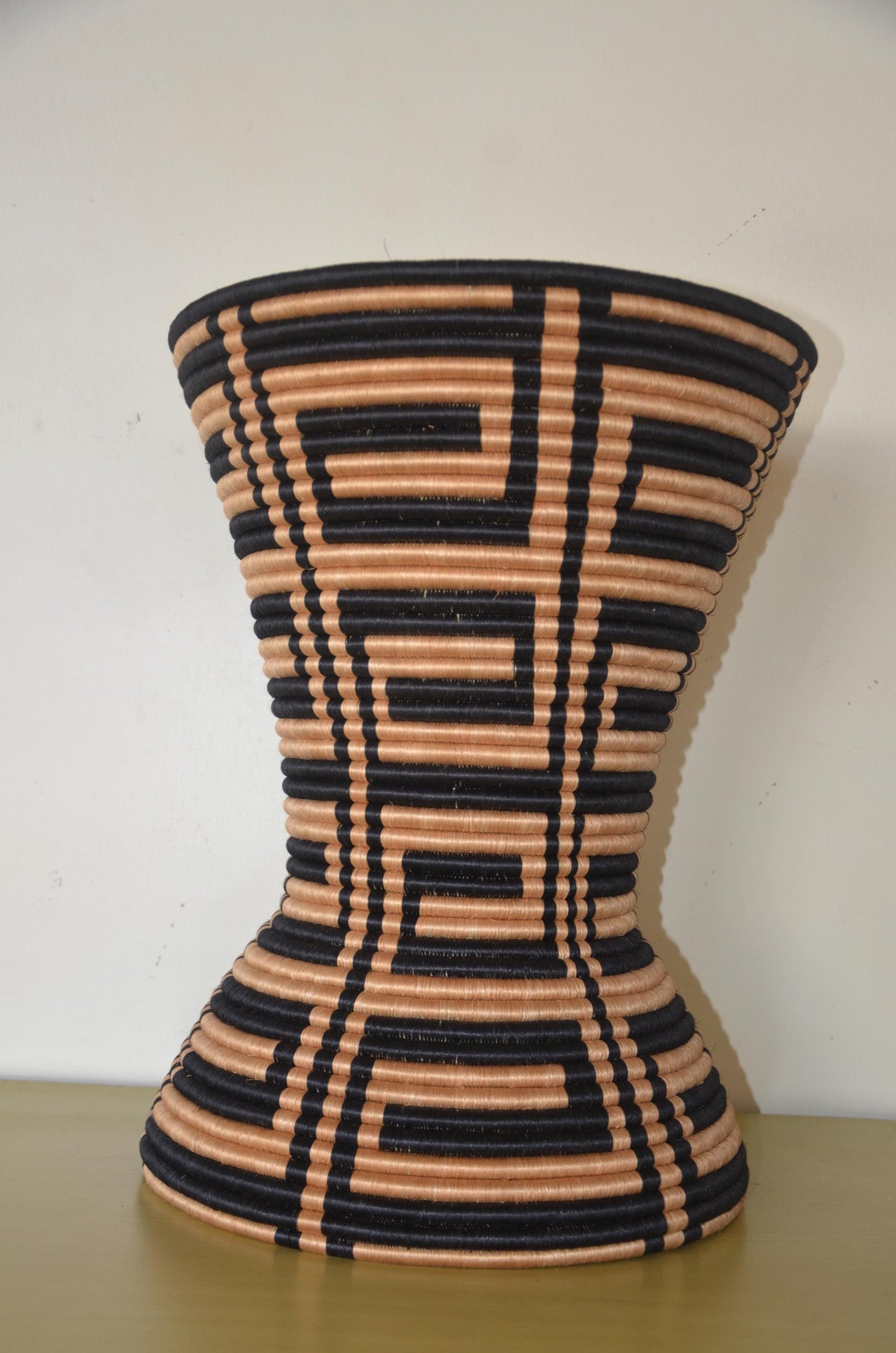 Rwandan Woven Hourglass Stand – 19" Black & Natural Pedestal – African Decor