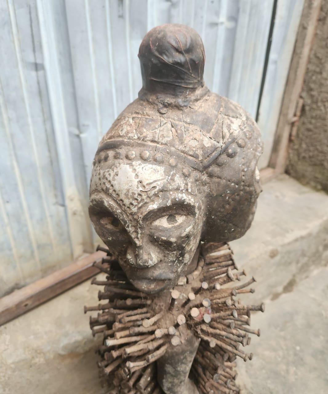 African Multi-faced Nkisi – Four-Faced Wood Congo Nail Power Statue Art