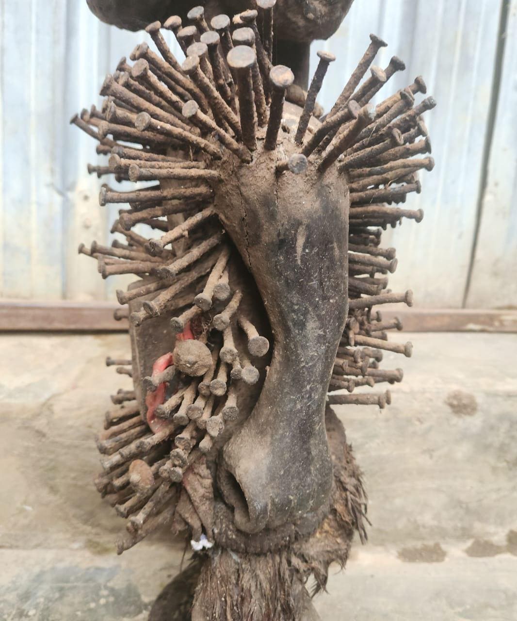 African Multi-faced Nkisi – Four-Faced Wood Congo Nail Power Statue Art