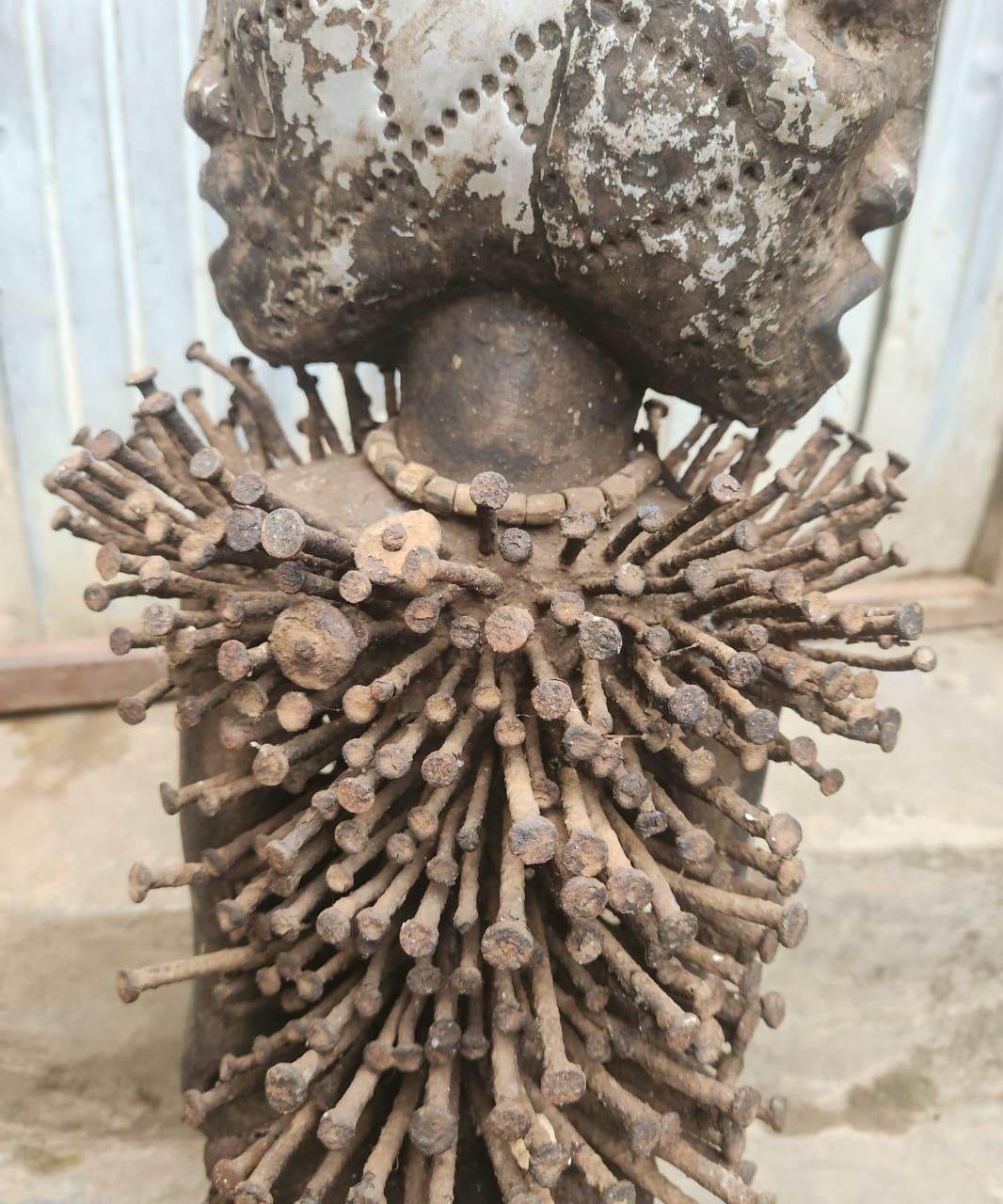 African Multi-faced Nkisi – Four-Faced Wood Congo Nail Power Statue Art