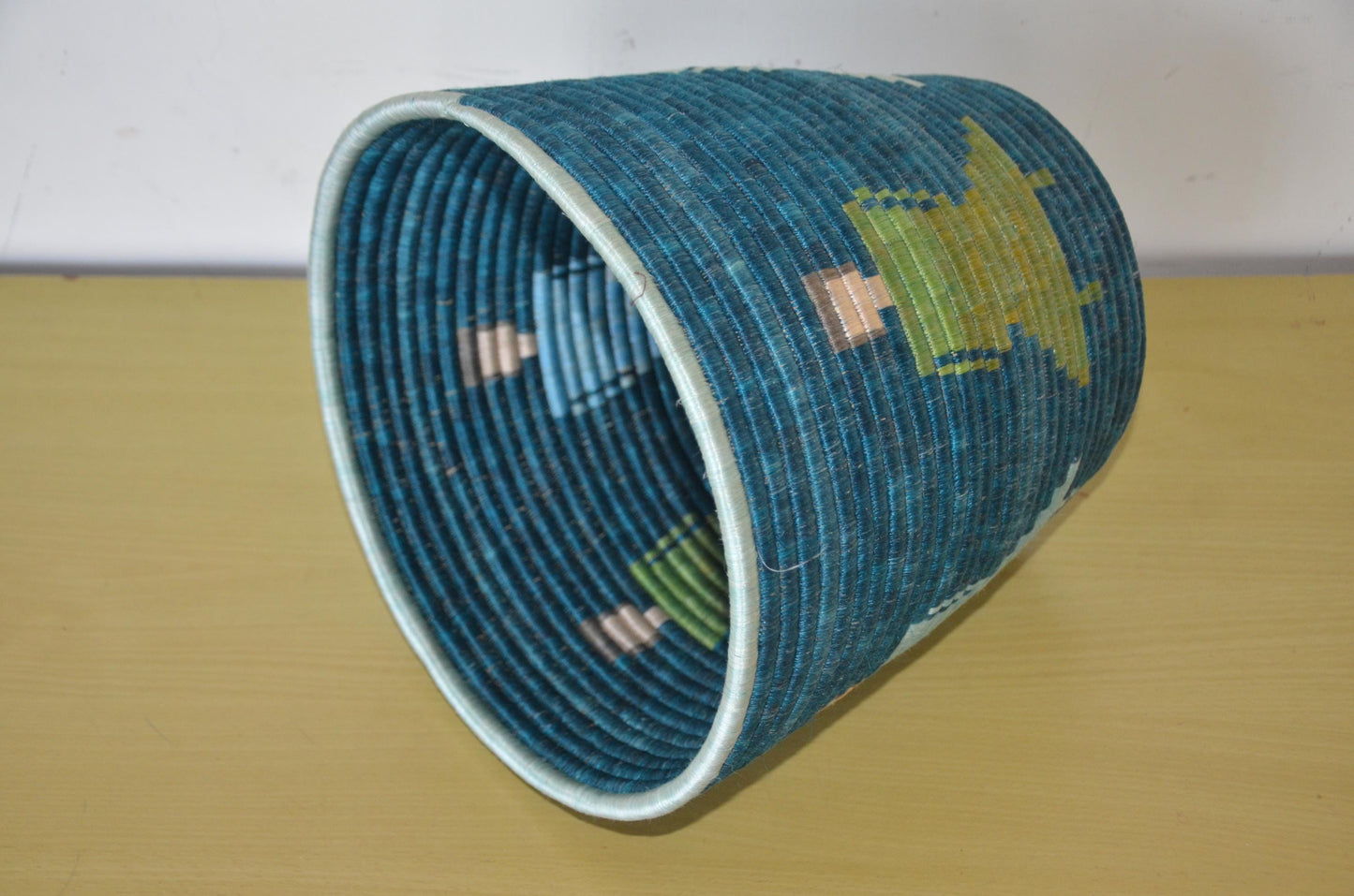 Handwoven African Coiled Basket | Deep Blue Figurative Art | Artisanal Storage Vessel