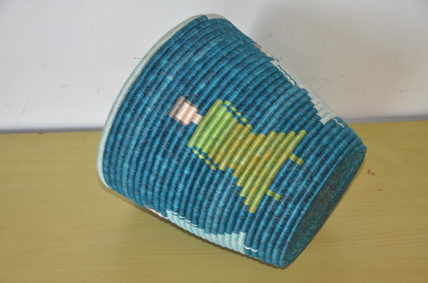 Handwoven African Coiled Basket | Deep Blue Figurative Art | Artisanal Storage Vessel