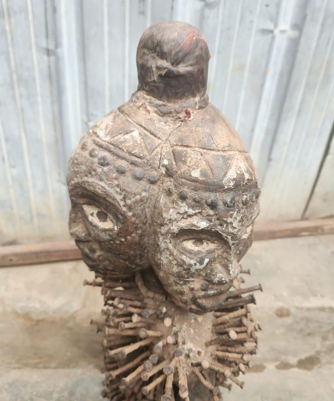 African Multi-faced Nkisi – Four-Faced Wood Congo Nail Power Statue Art